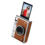 ⁦كاميرا فوجي فيلم إنستاكس ميني إيفو الهجينة للأفلام الفورية - بني (FJI INSTAX MINI EVO BROWN)⁩ - الصورة ⁦2⁩